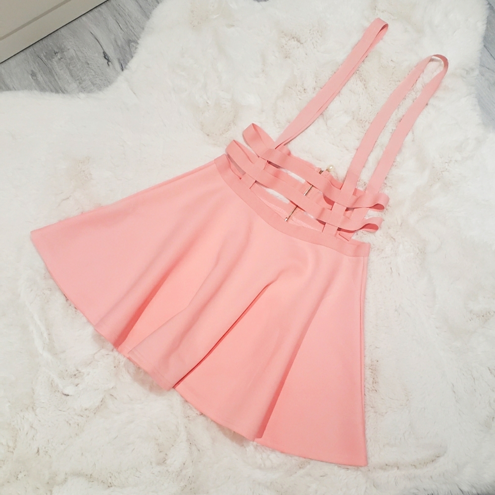Pink full circle skirt with suspenders and pearl zipper